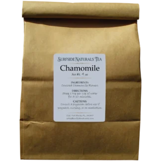 Surfside Naturals Tea chamomile flower tea in a tin tie brown kraft paper bag, 4 oz. White label lists crushed chamomile flower as the ingredient, directions to steep 1 tsp per cup of water for 5-10 minutes, and a caution to consult a physician if pregnant, nursing, or on medication.