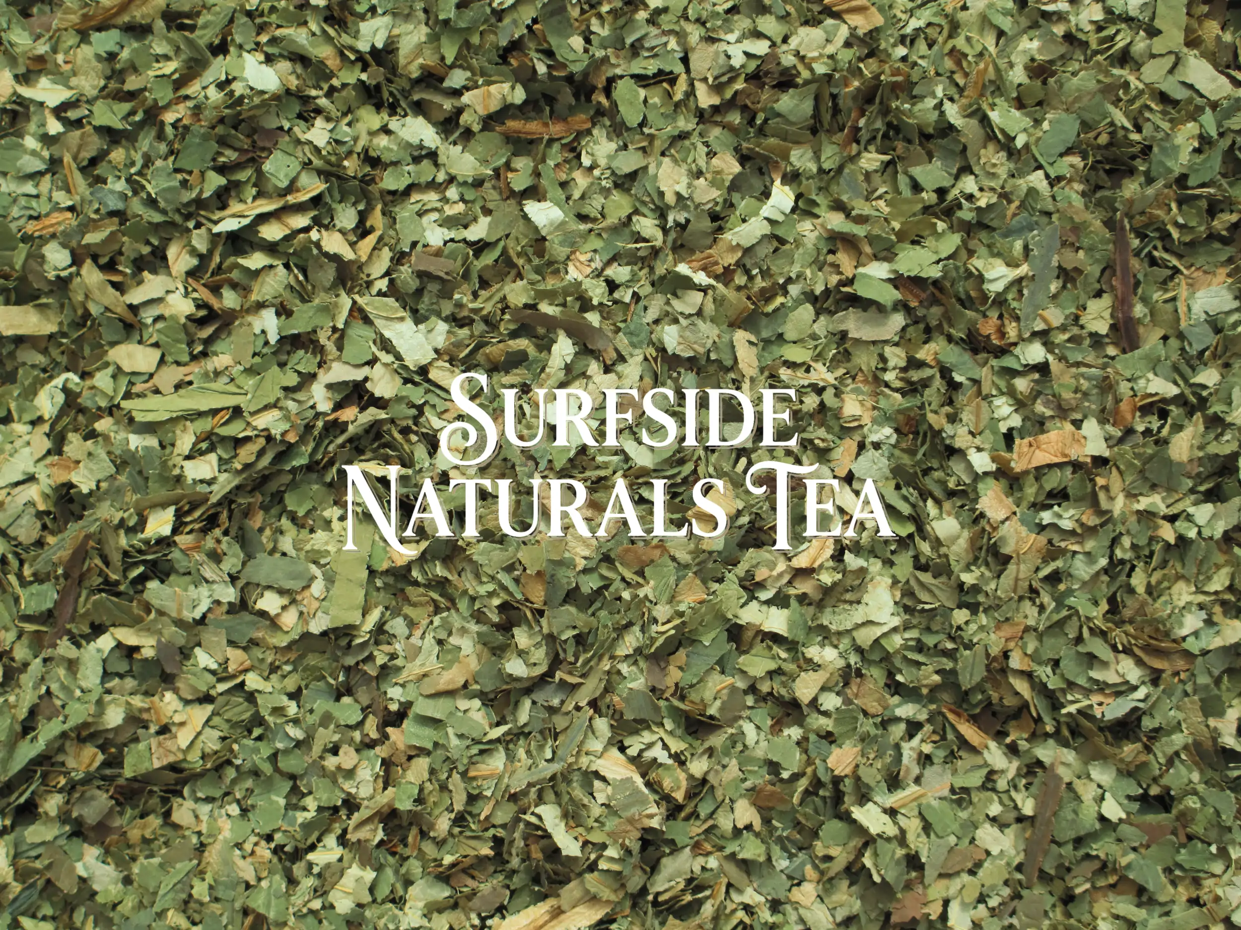 Loose leaf tea made from clean dried sacred lotus leaves cut into pieces about ¼ to ½ inch wide and 1–2 inches long, ranging from light to dark green with some tan pieces, with a "Surfside Naturals Tea" watermark in the center.