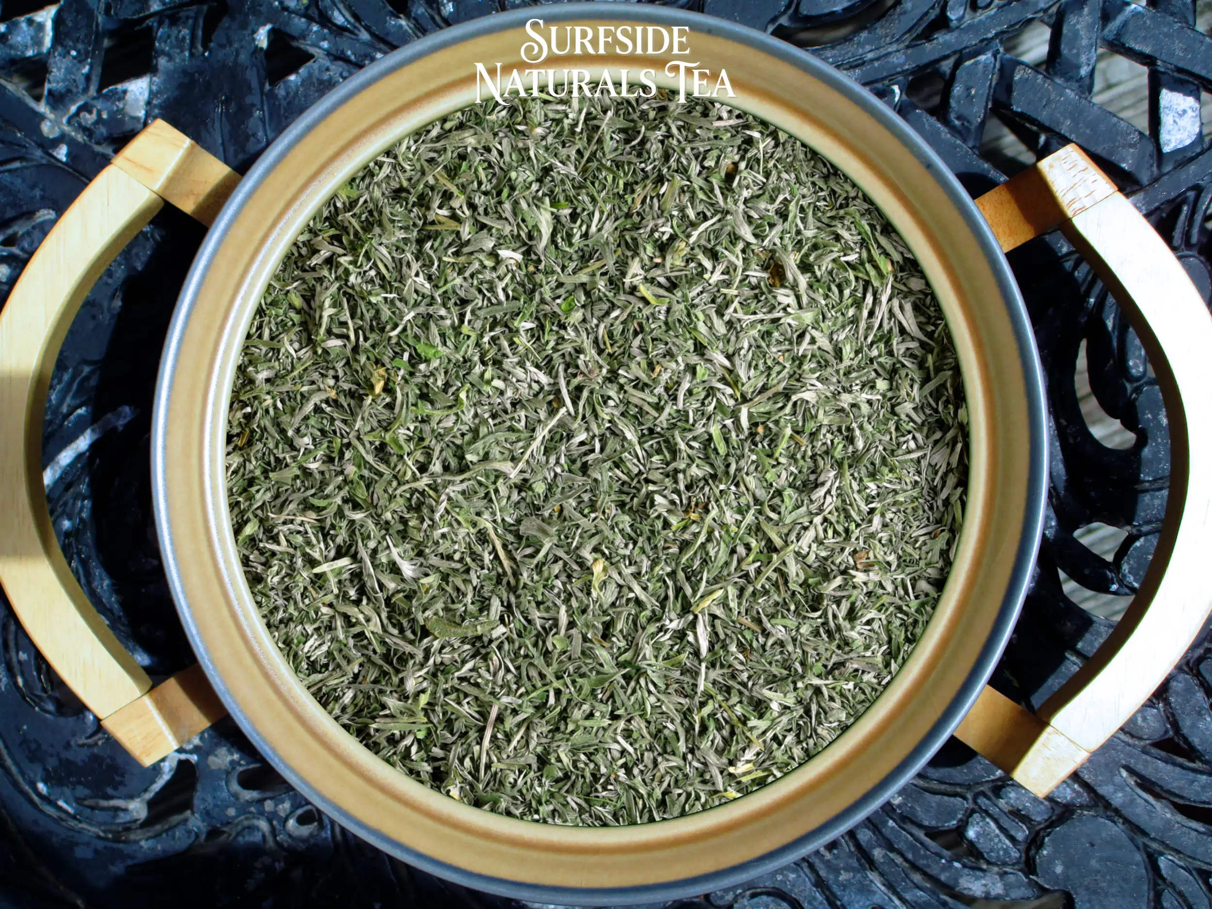 Organic wormwood in a ceramic bowl
